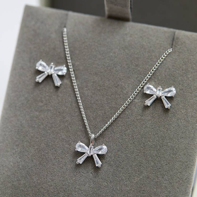 Jon Richard rhodium plated bow earrings and pendant set, UK version
