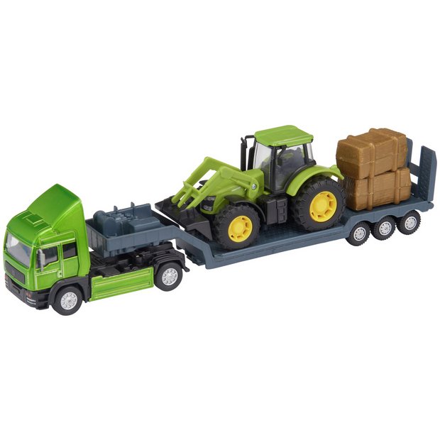 Teamsterz die-cast tractor transporter with hay bales, UK version