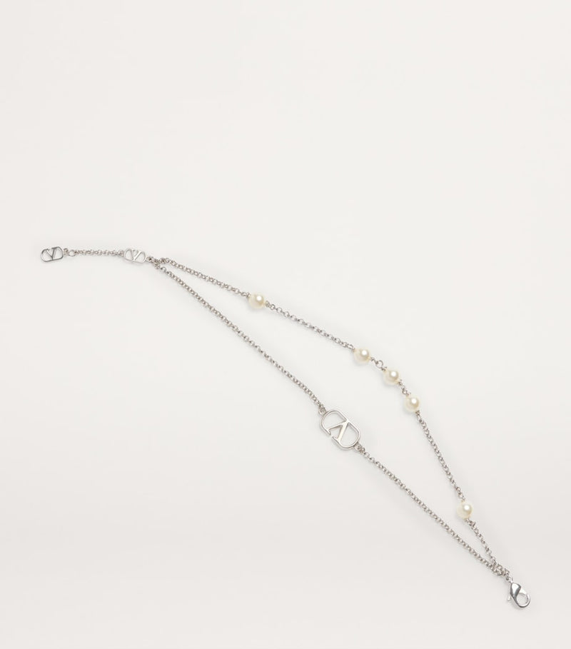 Valentino Garavani faux pearl VLogo bracelet - British product