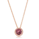 Round cut pink tourmaline pendant in 14ct rose gold (British brand)