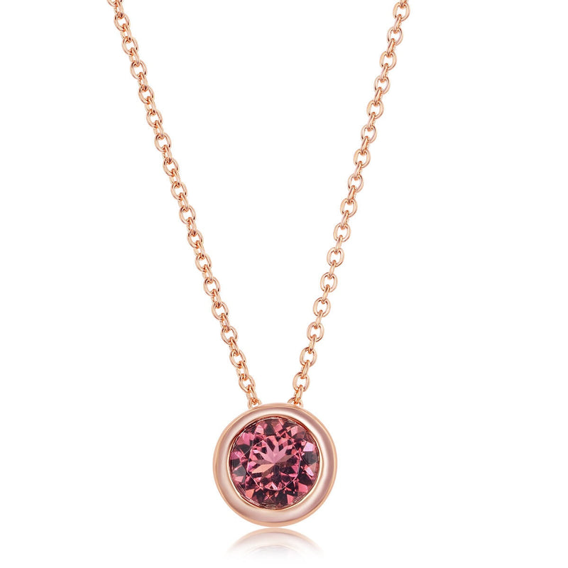 Round cut pink tourmaline pendant in 14ct rose gold (British brand)