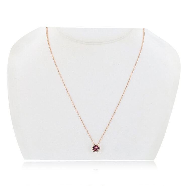 Round cut pink tourmaline pendant in 14ct rose gold (British brand)