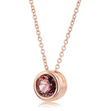 Round cut pink tourmaline pendant in 14ct rose gold (British brand)