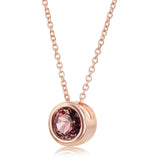 Round cut pink tourmaline pendant in 14ct rose gold (British brand)
