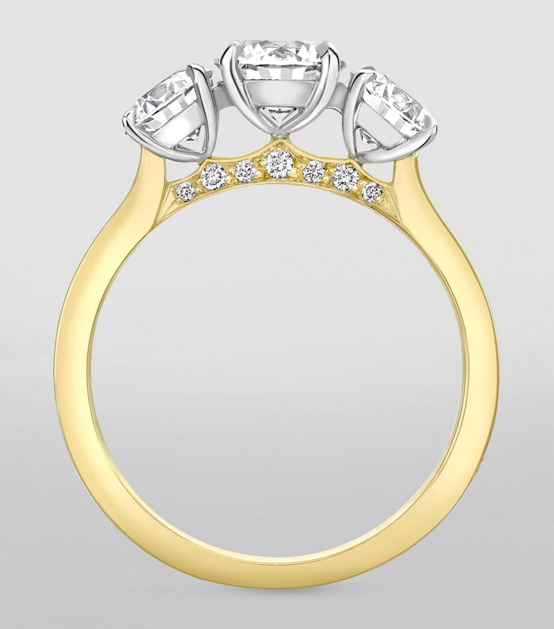 Boodles yellow gold platinum three stone diamond engagement ring, UK version