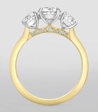 Boodles yellow gold platinum three stone diamond engagement ring, UK version
