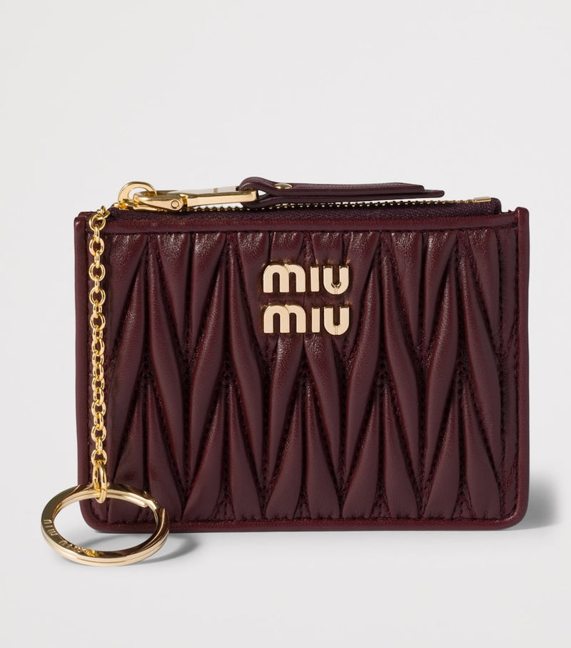 Miu Miu leather matelassé zipped card holder, imported from the UK