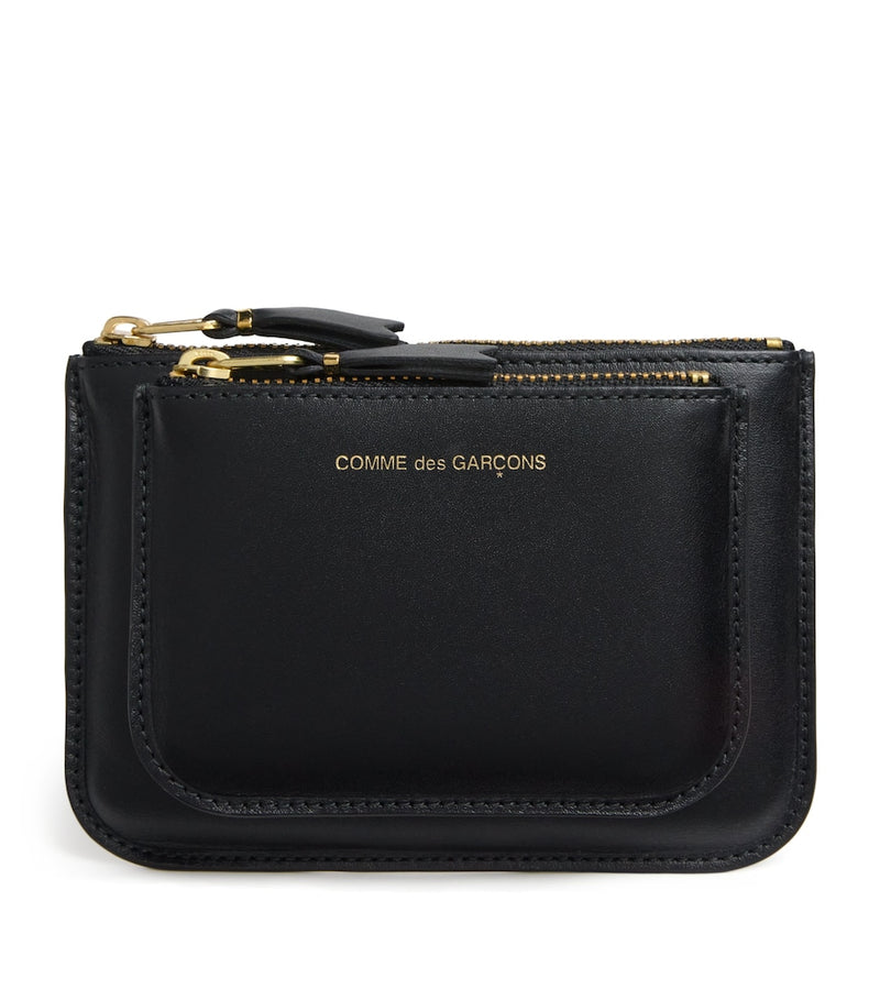 Comme des Garçons medium leather logo wallet, UK version