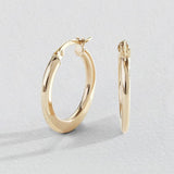 Argos Revere 9ct Yellow Gold Flat Hoop Earrings- Buy online at McGrocer