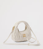 Miu Miu Wander matelassé leather top-handle bag (British brand)