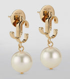 Jimmy Choo pearl earrings with resin pearl and JC monogram, UK version