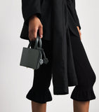 Talel leather triangle top-handle bag - British product