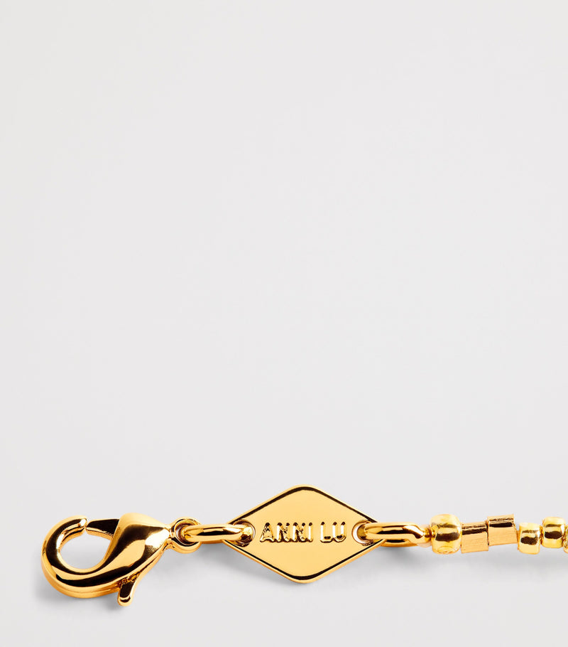 Anni Lu gold-plated beaded asymmetrical bracelet (British brand)