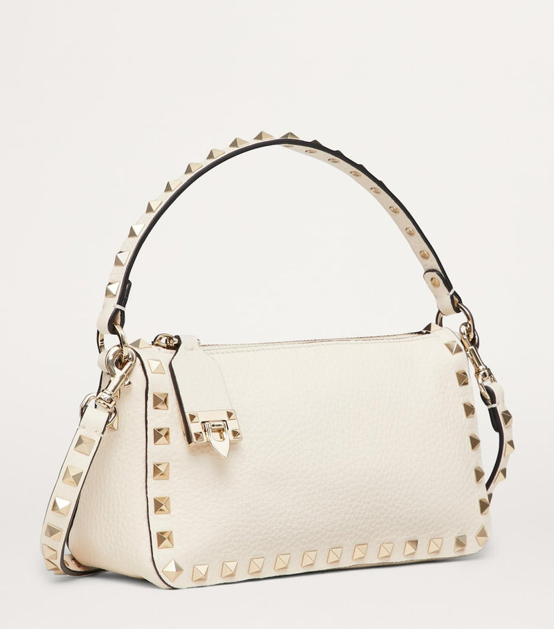 Valentino Garavani small leather Rockstud shoulder bag (British brand)