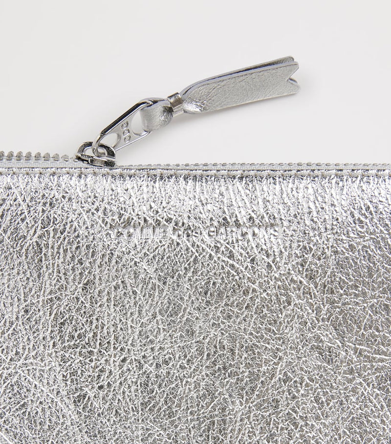 Comme Des Garçons large leather pouch, imported from the UK