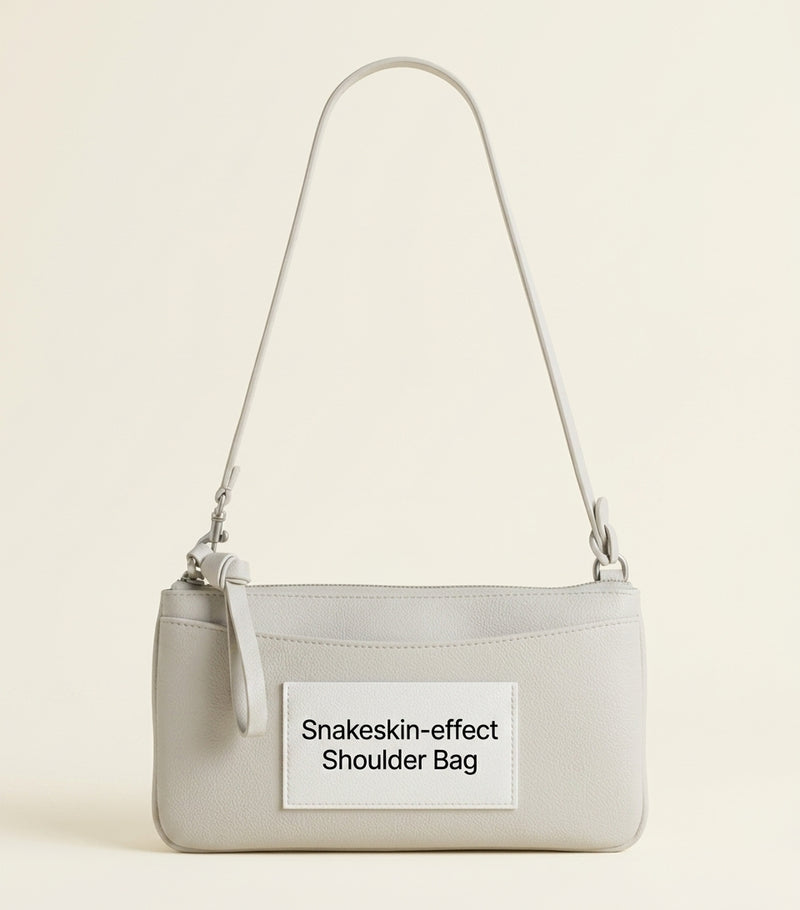 Balenciaga python-embossed calfskin pouch turn-lock closure (British brand)