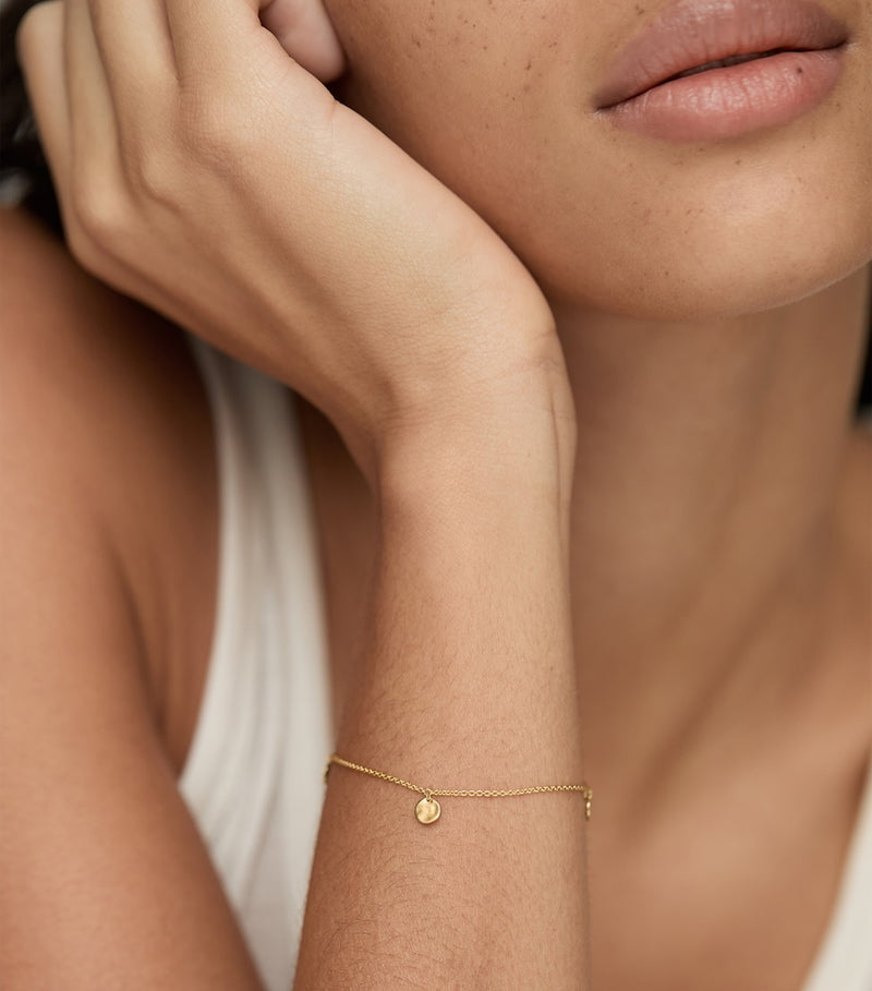 Monica Vinader gold vermeil chain bracelet with textured discs, imported from the UK