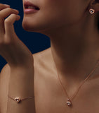 Chopard Happy Diamonds rose gold diamond earrings (British brand)