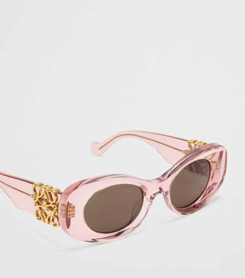 LOEWE oval sunglasses with bevelled acetate frame, imported from the UK