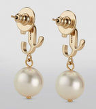 Jimmy Choo pearl earrings with resin pearl and JC monogram, UK version