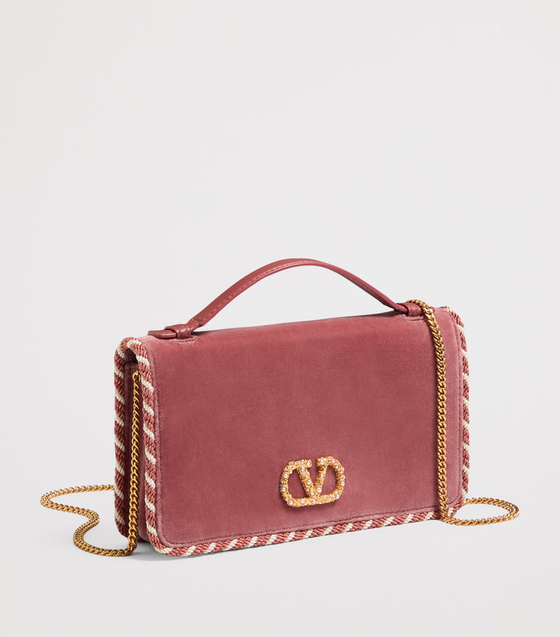 Valentino Garavani VLogo Signature wallet with strap (British brand)