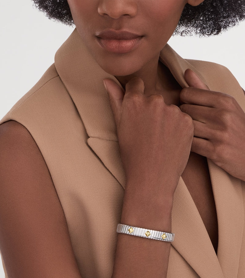 سوار Bvlgari Tubogas من الفولاذ المقاوم للصدأ والذهب الأصفر (ماركة بريطانية)