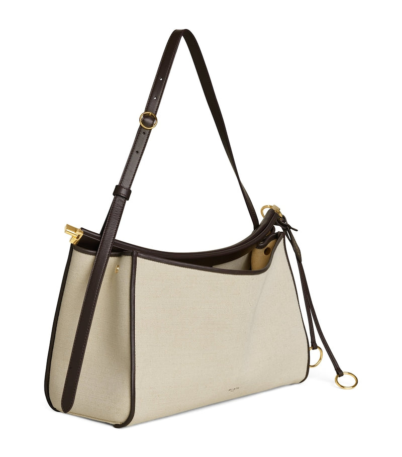 Alaïa Le Click Pocket 35 shoulder bag in calf leather - British product