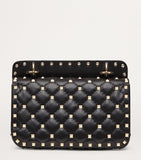 Valentino Garavani Rockstud Spike small top-handle bag (British brand)