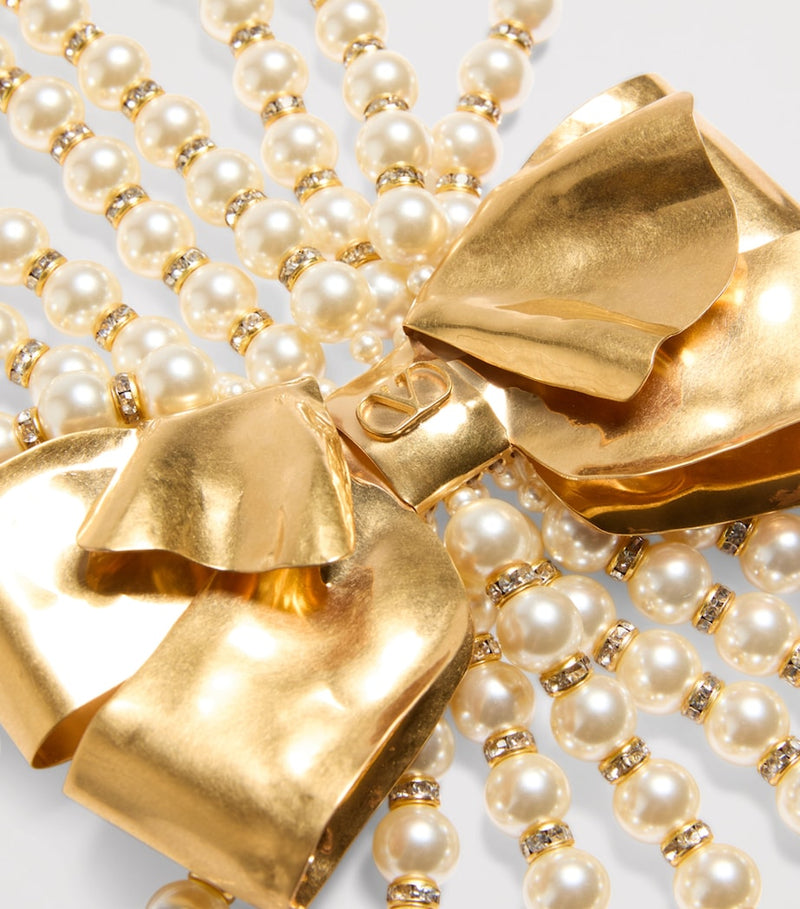 Valentino Garavani faux pearl layered necklace with brass bows, UK version