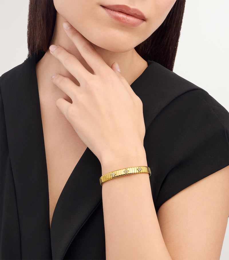 Bvlgari yellow gold Tubogas bangle with diamonds (British brand)