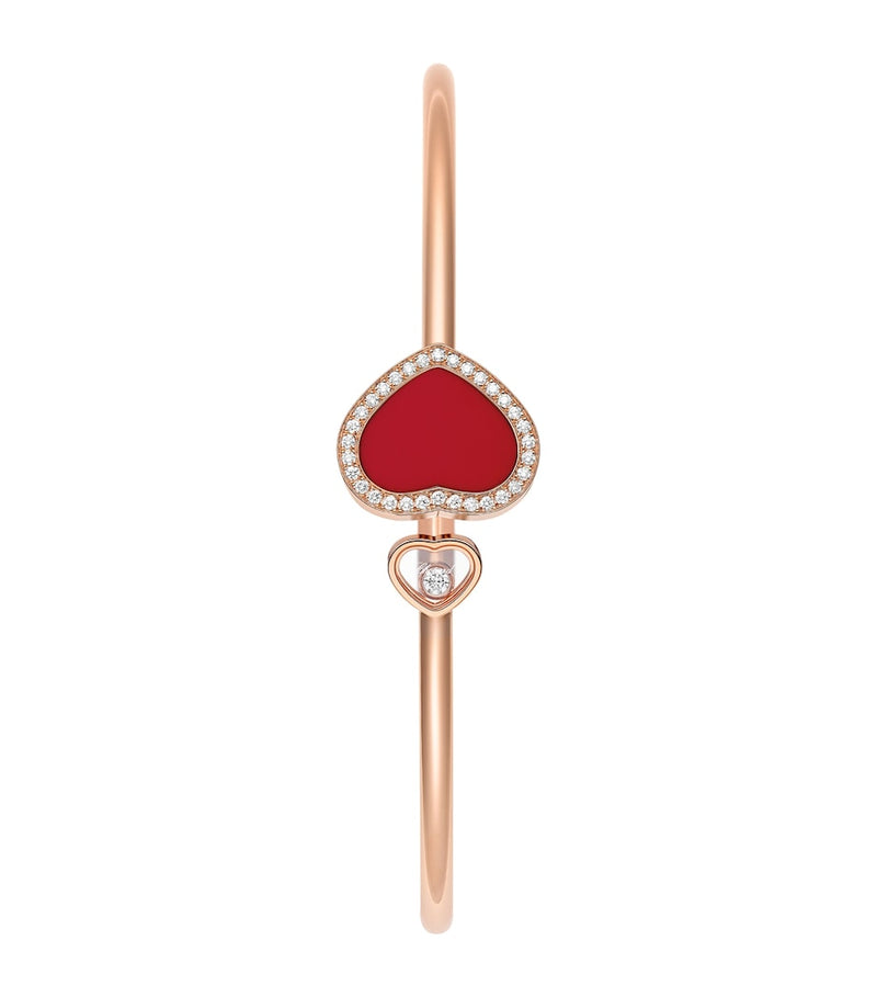 Chopard Happy Hearts rose gold bangle with moving diamond and red stone (British brand)