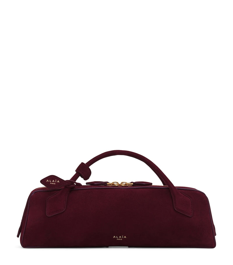 Alaïa Le Teckel suede top-handle bag, imported from the UK