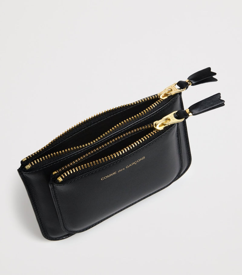 Comme des Garçons medium leather logo wallet, UK version