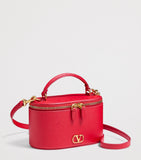 Valentino Garavani mini leather vanity case top-handle bag - British product