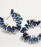 Suzanne Kalan blue sapphire spiral earrings in white gold, imported from the UK