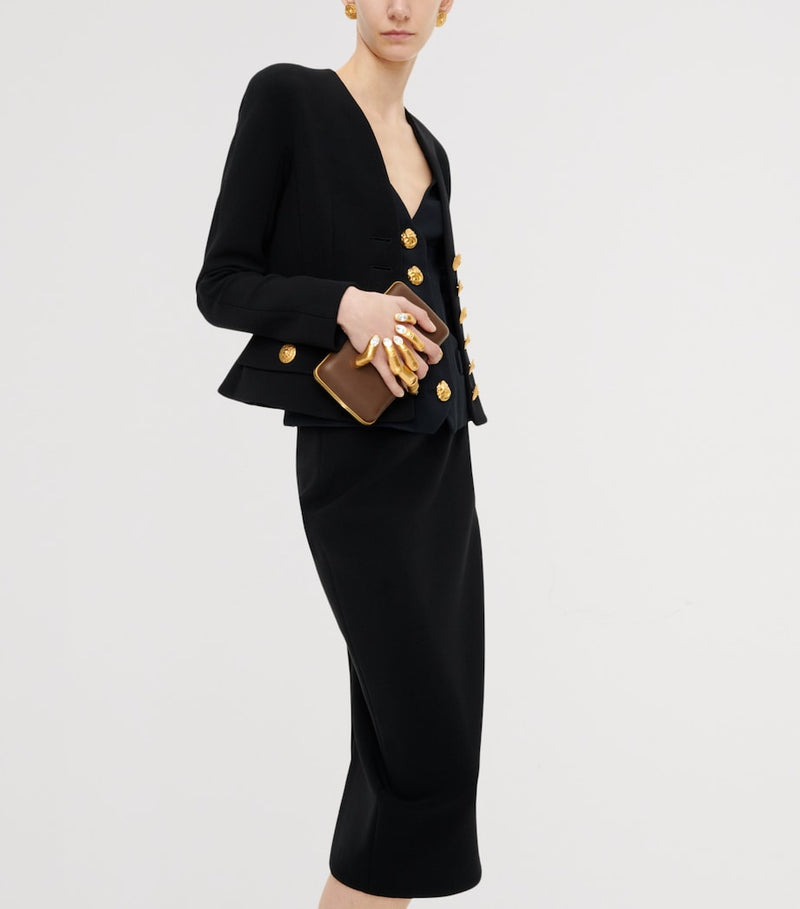 Schiaparelli Hand In Hand clutch bag with rhinestone fingernails, imported from the UK