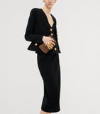Schiaparelli Hand In Hand clutch bag with rhinestone fingernails, imported from the UK