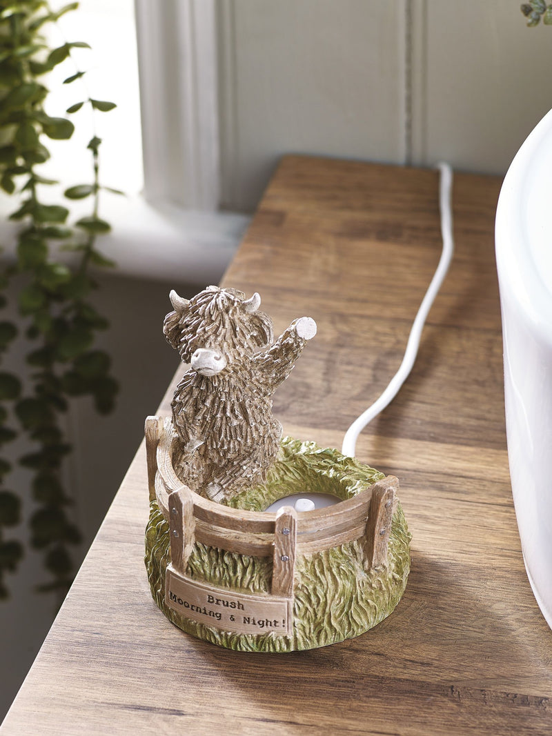 Electric toothbrush holder with Hamish the Highland Cow design - British product