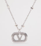 Valentino Garavani VLogo pendant necklace, imported from the UK