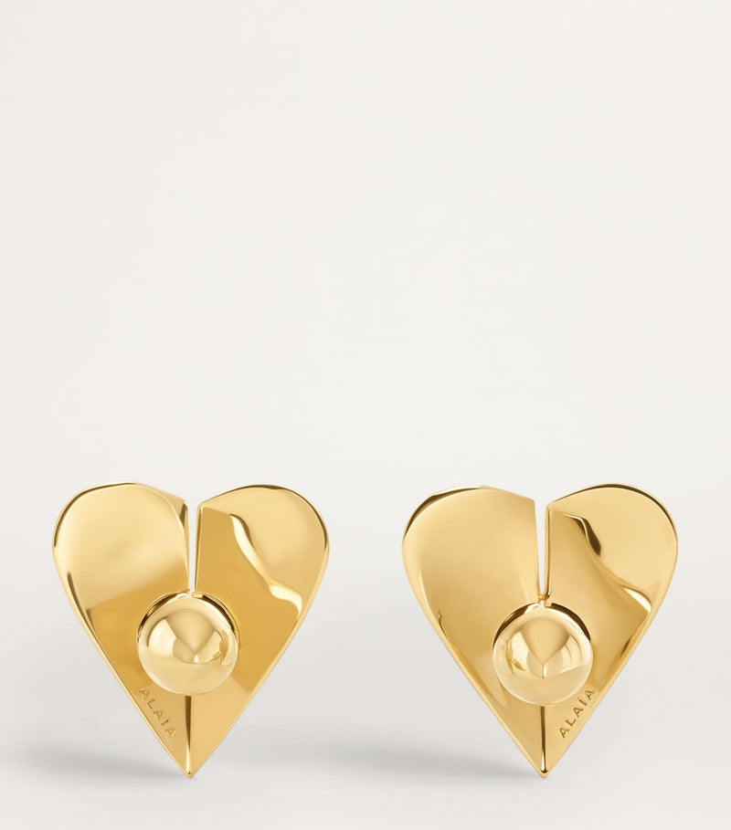 Alaïa Le Coeur mini brass earrings (British brand)