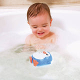 Chad Valley Sprinkle Penguin bath toy floating with water spray (British brand)