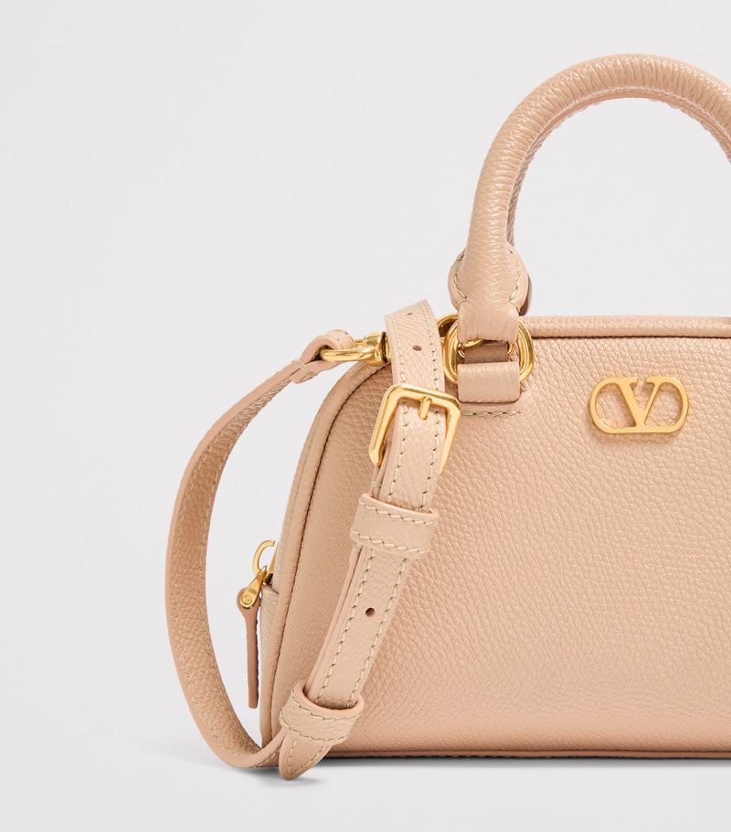 Valentino Garavani mini grained leather VLogo Signature bag, imported from the UK
