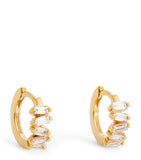 Suzanne Kalan yellow gold huggie earrings with baguette diamonds (British brand)