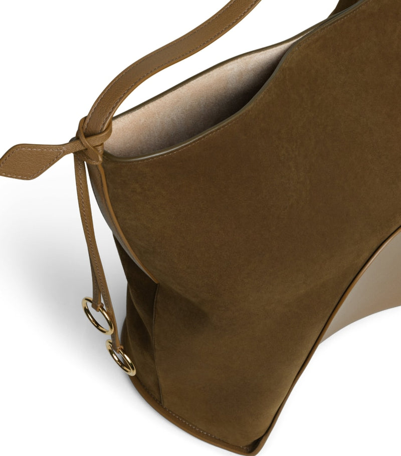 Alaïa large suede-leather hip bucket bag (British brand)