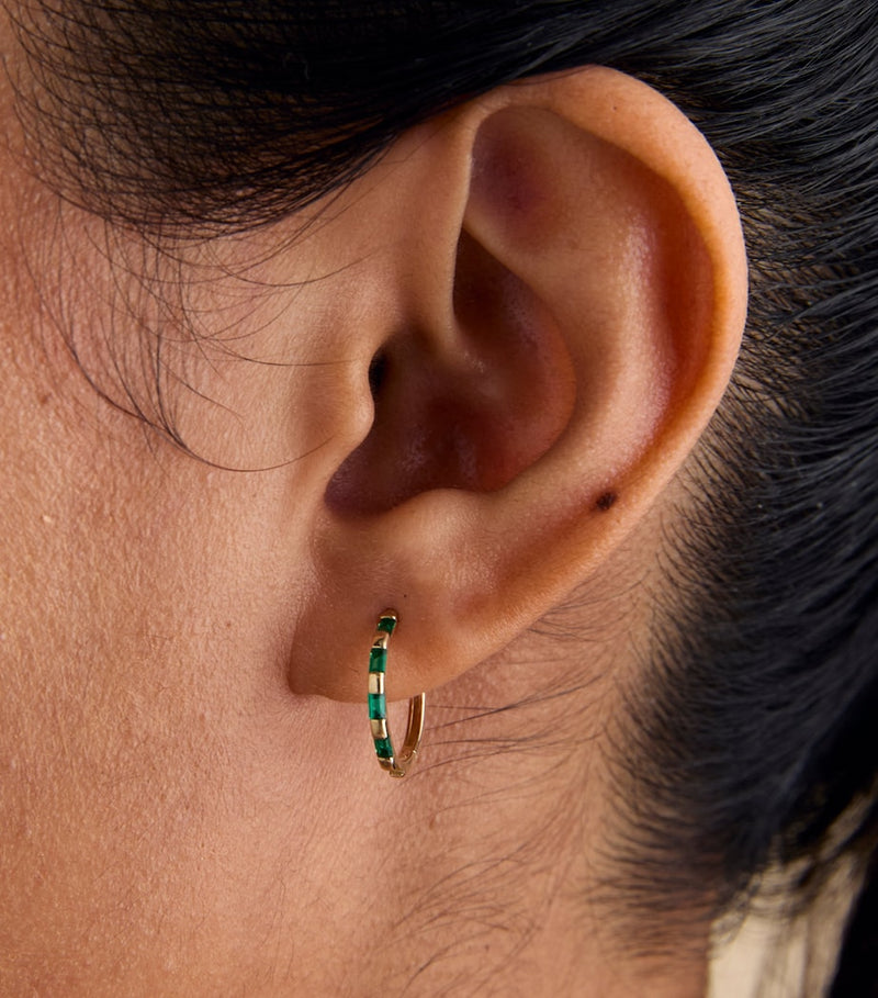 Astrid & Miyu yellow gold emerald baguette hoop earrings, UK version