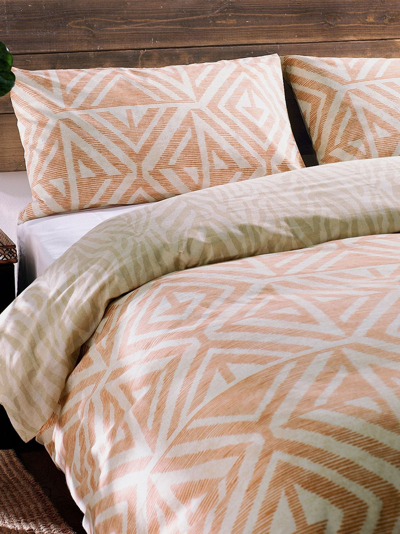 Terracotta orange reversible duvet cover set with Tanza design - British product