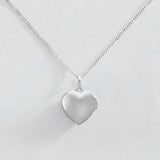Revere silver heart-shaped locket with fairy charm 18 inch chain (British brand)