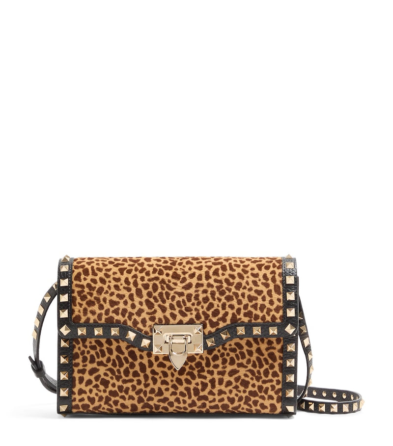 Valentino Garavani small leather rockstud shoulder bag (British brand)