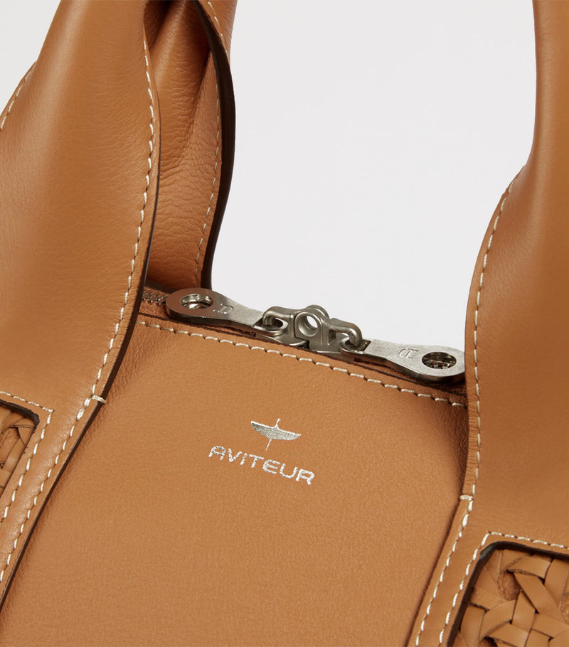 Aviteur leather woven-detail holdall - British product