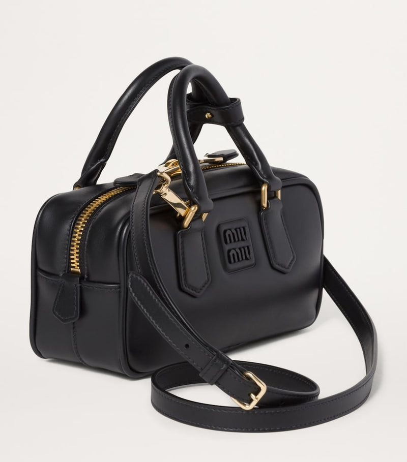 Miu Miu Arcadie top-handle bag in leather, imported from the UK